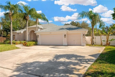 This stunning home has it all! With 4 bedrooms, 3 bathrooms, a on Bloomingdale Golfers Club in Florida - for sale on GolfHomes.com, golf home, golf lot