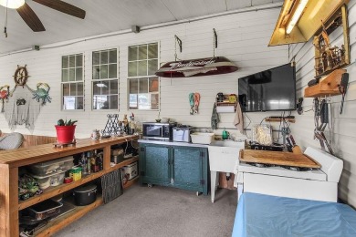 HOME, BOAT , GOLF CART AND MULTIPLE STORAGE BUILDINGS CAN BE ALL on Sapelo Hammock Golf Club in Georgia - for sale on GolfHomes.com, golf home, golf lot