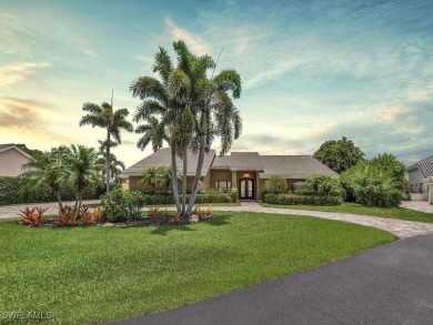 Welcome to one of the most stunning lakefront homes in on Fiddlesticks Country Club in Florida - for sale on GolfHomes.com, golf home, golf lot