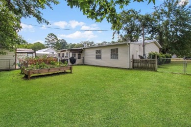 HOME, BOAT , GOLF CART AND MULTIPLE STORAGE BUILDINGS CAN BE ALL on Sapelo Hammock Golf Club in Georgia - for sale on GolfHomes.com, golf home, golf lot