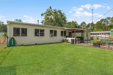 HOME, BOAT , GOLF CART AND MULTIPLE STORAGE BUILDINGS CAN BE ALL on Sapelo Hammock Golf Club in Georgia - for sale on GolfHomes.com, golf home, golf lot