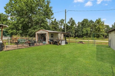 HOME, BOAT , GOLF CART AND MULTIPLE STORAGE BUILDINGS CAN BE ALL on Sapelo Hammock Golf Club in Georgia - for sale on GolfHomes.com, golf home, golf lot