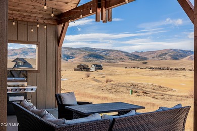 This stunning dual-master home offers exceptional comfort on Grand Elk Ranch and Club in Colorado - for sale on GolfHomes.com, golf home, golf lot