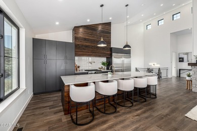 Wow! This extraordinary 7-bedroom retreat in Granby Ranch is on Headwaters Golf Course At Granby Ranch in Colorado - for sale on GolfHomes.com, golf home, golf lot