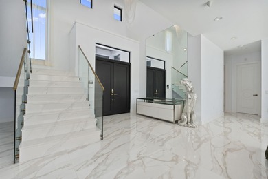 Contemporary Coastal Living in Boca Raton. Stunning Custom Built on  in Florida - for sale on GolfHomes.com, golf home, golf lot