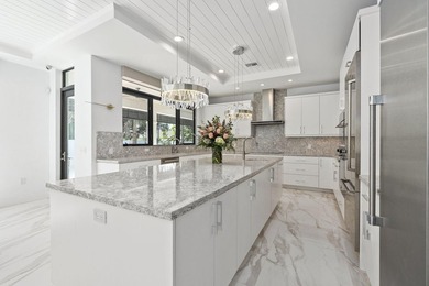 Contemporary Coastal Living in Boca Raton. Stunning Custom Built on Red Reef Executive Golf Course in Florida - for sale on GolfHomes.com, golf home, golf lot