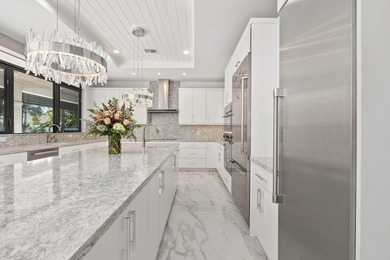 Contemporary Coastal Living in Boca Raton. Stunning Custom Built on Red Reef Executive Golf Course in Florida - for sale on GolfHomes.com, golf home, golf lot