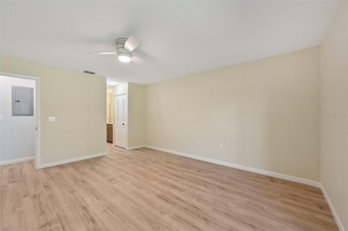 Your vacation doesn't have to end!  This freshly and completely on Capri Isle Golf Club in Florida - for sale on GolfHomes.com, golf home, golf lot