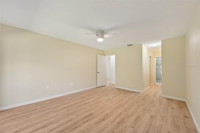 Your vacation doesn't have to end!  This freshly and completely on Capri Isle Golf Club in Florida - for sale on GolfHomes.com, golf home, golf lot