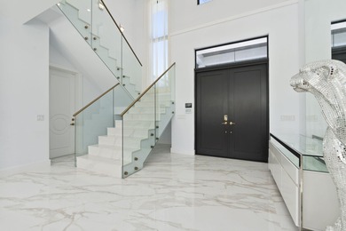 Contemporary Coastal Living in Boca Raton. Stunning Custom Built on  in Florida - for sale on GolfHomes.com, golf home, golf lot