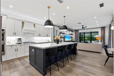 Welcome to your dream home--an elegant and functional retreat on Quail West Golf and Country Club in Florida - for sale on GolfHomes.com, golf home, golf lot