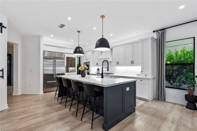 Welcome to your dream home--an elegant and functional retreat on Quail West Golf and Country Club in Florida - for sale on GolfHomes.com, golf home, golf lot