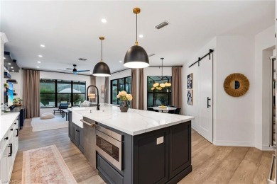 Welcome to your dream home--an elegant and functional retreat on Quail West Golf and Country Club in Florida - for sale on GolfHomes.com, golf home, golf lot