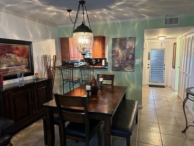 Beautiful water view updated 1 bedroom, 1 1/2 bath condo on Sunrise Lakes Phase III in Florida - for sale on GolfHomes.com, golf home, golf lot