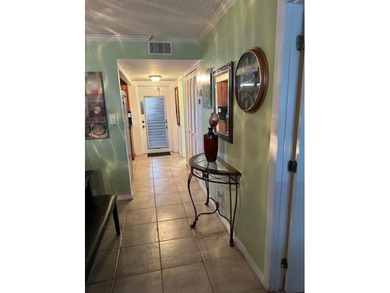 Beautiful water view updated 1 bedroom, 1 1/2 bath condo on Sunrise Lakes Phase III in Florida - for sale on GolfHomes.com, golf home, golf lot