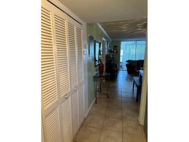 Beautiful water view updated 1 bedroom, 1 1/2 bath condo on Sunrise Lakes Phase III in Florida - for sale on GolfHomes.com, golf home, golf lot