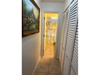 Beautiful water view updated 1 bedroom, 1 1/2 bath condo on Sunrise Lakes Phase III in Florida - for sale on GolfHomes.com, golf home, golf lot