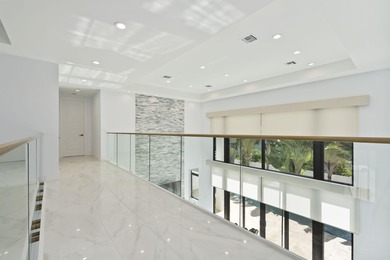 Contemporary Coastal Living in Boca Raton. Stunning Custom Built on  in Florida - for sale on GolfHomes.com, golf home, golf lot