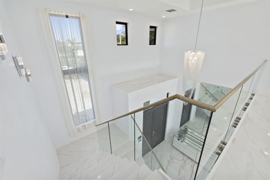 Contemporary Coastal Living in Boca Raton. Stunning Custom Built on  in Florida - for sale on GolfHomes.com, golf home, golf lot