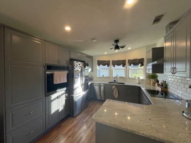 Listed by the Official Sales Team of Cypress Lakes Village on Big Cypress Golf and Country Club in Florida - for sale on GolfHomes.com, golf home, golf lot
