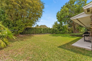 Beautifully located on a quiet cul-de-sac in the village of on Killian Greens Golf Club in Florida - for sale on GolfHomes.com, golf home, golf lot