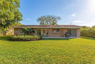 Beautifully located on a quiet cul-de-sac in the village of on Killian Greens Golf Club in Florida - for sale on GolfHomes.com, golf home, golf lot