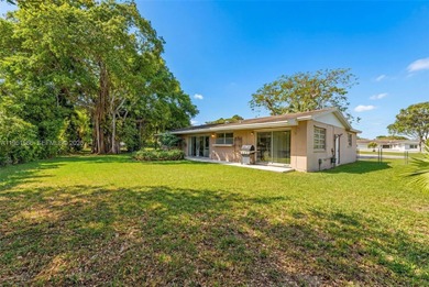 Beautifully located on a quiet cul-de-sac in the village of on Killian Greens Golf Club in Florida - for sale on GolfHomes.com, golf home, golf lot