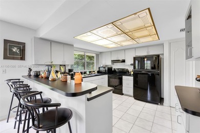 Beautifully located on a quiet cul-de-sac in the village of on Killian Greens Golf Club in Florida - for sale on GolfHomes.com, golf home, golf lot