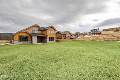 You will love this gorgeous 5-bedroom home with a spacious on Headwaters Golf Course At Granby Ranch in Colorado - for sale on GolfHomes.com, golf home, golf lot