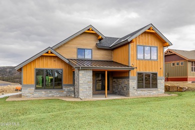 You will love this gorgeous 5-bedroom home with a spacious on Headwaters Golf Course At Granby Ranch in Colorado - for sale on GolfHomes.com, golf home, golf lot