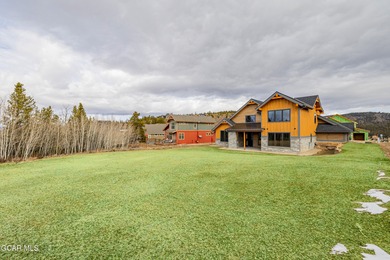You will love this gorgeous 5-bedroom home with a spacious on Headwaters Golf Course At Granby Ranch in Colorado - for sale on GolfHomes.com, golf home, golf lot