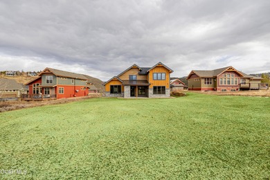 You will love this gorgeous 5-bedroom home with a spacious on Headwaters Golf Course At Granby Ranch in Colorado - for sale on GolfHomes.com, golf home, golf lot