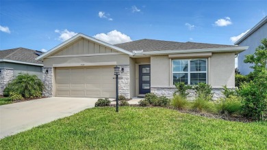 Welcome to your dream home at 17119 Barnwood, nestled in the on Esplanade Golf and Country at Lakewood Ranch in Florida - for sale on GolfHomes.com, golf home, golf lot