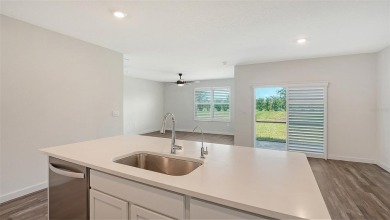 Welcome to your dream home at 17119 Barnwood, nestled in the on Esplanade Golf and Country at Lakewood Ranch in Florida - for sale on GolfHomes.com, golf home, golf lot
