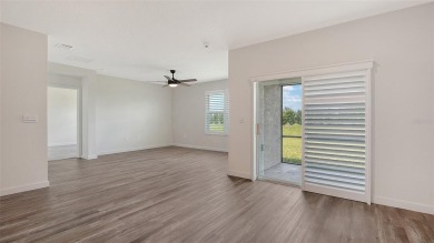 Welcome to your dream home at 17119 Barnwood, nestled in the on Esplanade Golf and Country at Lakewood Ranch in Florida - for sale on GolfHomes.com, golf home, golf lot