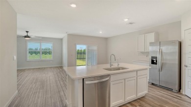 Welcome to your dream home at 17119 Barnwood, nestled in the on Esplanade Golf and Country at Lakewood Ranch in Florida - for sale on GolfHomes.com, golf home, golf lot