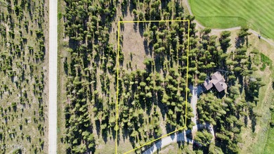 Overlooking the magnificent 27-hole Pole Creek Golf Club, this on Pole Creek Golf Club in Colorado - for sale on GolfHomes.com, golf home, golf lot