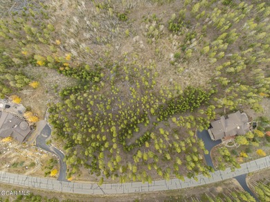 Overlooking the stunning 27-hole Pole Creek Golf Club, this on Pole Creek Golf Club in Colorado - for sale on GolfHomes.com, golf home, golf lot