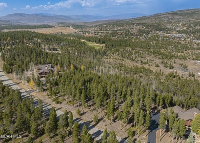 Overlooking the stunning 27-hole Pole Creek Golf Club, this on Pole Creek Golf Club in Colorado - for sale on GolfHomes.com, golf home, golf lot