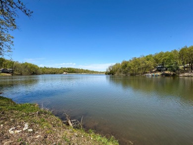 Lakefront lot on the peaceful shores of Lake Aztec in Cherokee on Cherokee Village South Course in Arkansas - for sale on GolfHomes.com, golf home, golf lot