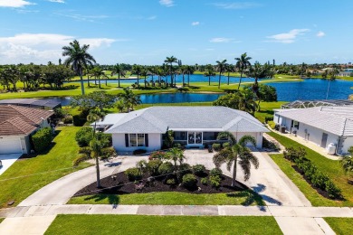 IT IS ALL ABOUT THE LOCATION. This home sits on a lake looking on Island Country Club in Florida - for sale on GolfHomes.com, golf home, golf lot