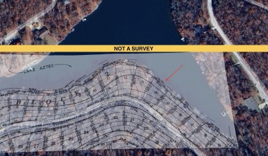 Lakefront lot on the peaceful shores of Lake Aztec in Cherokee on Cherokee Village South Course in Arkansas - for sale on GolfHomes.com, golf home, golf lot