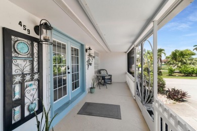 IT IS ALL ABOUT THE LOCATION. This home sits on a lake looking on Island Country Club in Florida - for sale on GolfHomes.com, golf home, golf lot