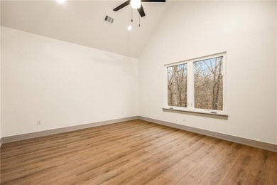 This home is truly a hole-in-one for those seeking a on Bella Vista Country Club - Scottsdale in Arkansas - for sale on GolfHomes.com, golf home, golf lot