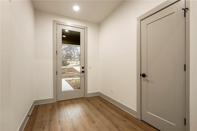 This home is truly a hole-in-one for those seeking a on Bella Vista Country Club - Scottsdale in Arkansas - for sale on GolfHomes.com, golf home, golf lot