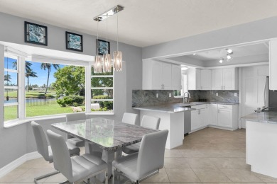 IT IS ALL ABOUT THE LOCATION. This home sits on a lake looking on Island Country Club in Florida - for sale on GolfHomes.com, golf home, golf lot