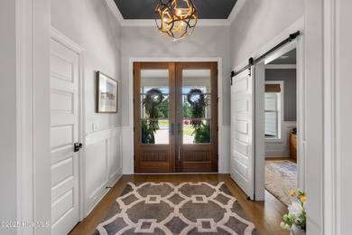 Custom George Crane with expansive golf views and pool. Welcome on Members Club At St. James Plantation in North Carolina - for sale on GolfHomes.com, golf home, golf lot