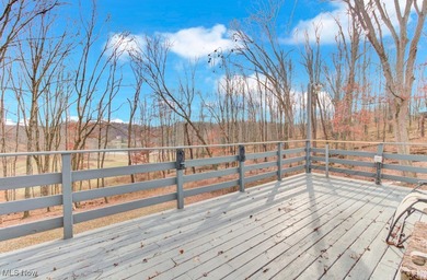 Welcome to your cozy Lake Mohawk retreat! This updated home sits on Lake Mohawk Golf Club in Ohio - for sale on GolfHomes.com, golf home, golf lot