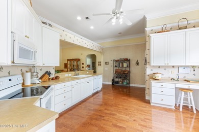 This well-maintained residence spans approximately 2,234 sq ft on Sea Trail Golf Resort in North Carolina - for sale on GolfHomes.com, golf home, golf lot