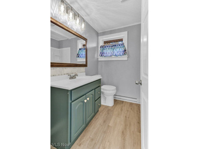 Welcome to your cozy Lake Mohawk retreat! This updated home sits on Lake Mohawk Golf Club in Ohio - for sale on GolfHomes.com, golf home, golf lot